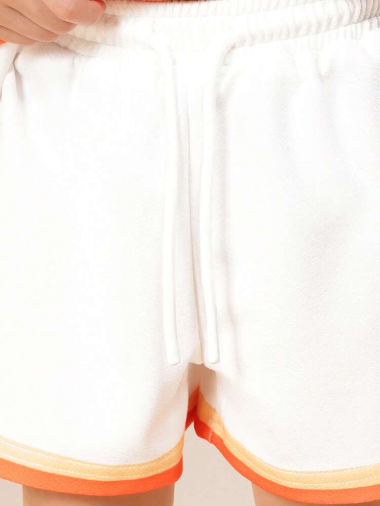 T-Shirt And Shorts Set With Orange Trim