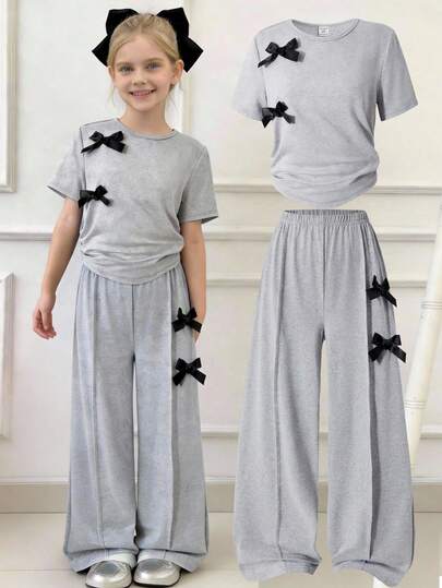 Girls Casual Everyday Round Neck Short Sleeve Cropped Black T-Shirt With 3D Bow Decor And Straight Loose Pants Summer Set