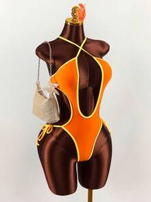 Amplova 女士交叉绑带露背连体泳衣，撞色包边，性感前卫，适合度假穿着 - 亮橙色 - 查看 1