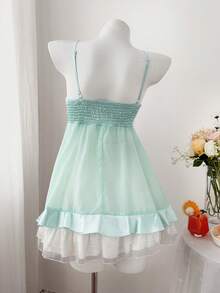 Sweetra Áo kiểu dáng cỡ lớn mới về, thanh lịch, ngọt ngào, thích hợp đi chơi, chất liệu chiffon và satin, viền bèo nhún, dây buộc, vạt áo bất đối xứng, áo crop top không tay cho mùa xuân, hè, thu. - Màu xanh Bạc hà - Xem 2