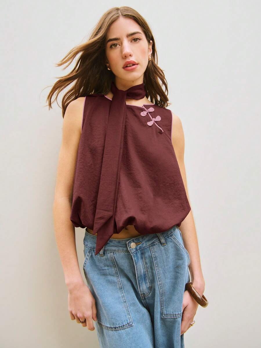 Nöista S Sleeveless Elegant Blouse With Chinese-Style Knot Buttons And Scarf Neck Detail. Lightweight, Refined Design With A Relaxed Silhouette, Perfect For Elegant Outfits, Going Out Looks, Valentine's Day Styling, Spring And Summer Outfits, Or Chic Everyday Wear. - Burgundy - View 1