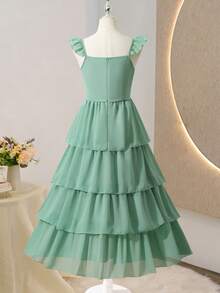 SHEIN 这款大码A字方领雪纺连衣裙，配有俏皮的细肩带和荷叶边细节，搭配独特的层叠蛋糕裙摆，尽显公主般的迷人气质。这是一款美丽优雅的小女孩派对礼服——绝对是一款令人惊艳的蛋糕裙！ - 綠色 - 查看 2