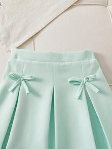 Souflis Souflis Young Girls' Sweet Pink Sleeveless Pearl Button Vest + Bowknot Pleated Skirt 2-Piece Set, Elegant Casual Summer Outfit Girls Mint Green Vest Skirt Set Kids Light Green Skirt Set - Green - View 4