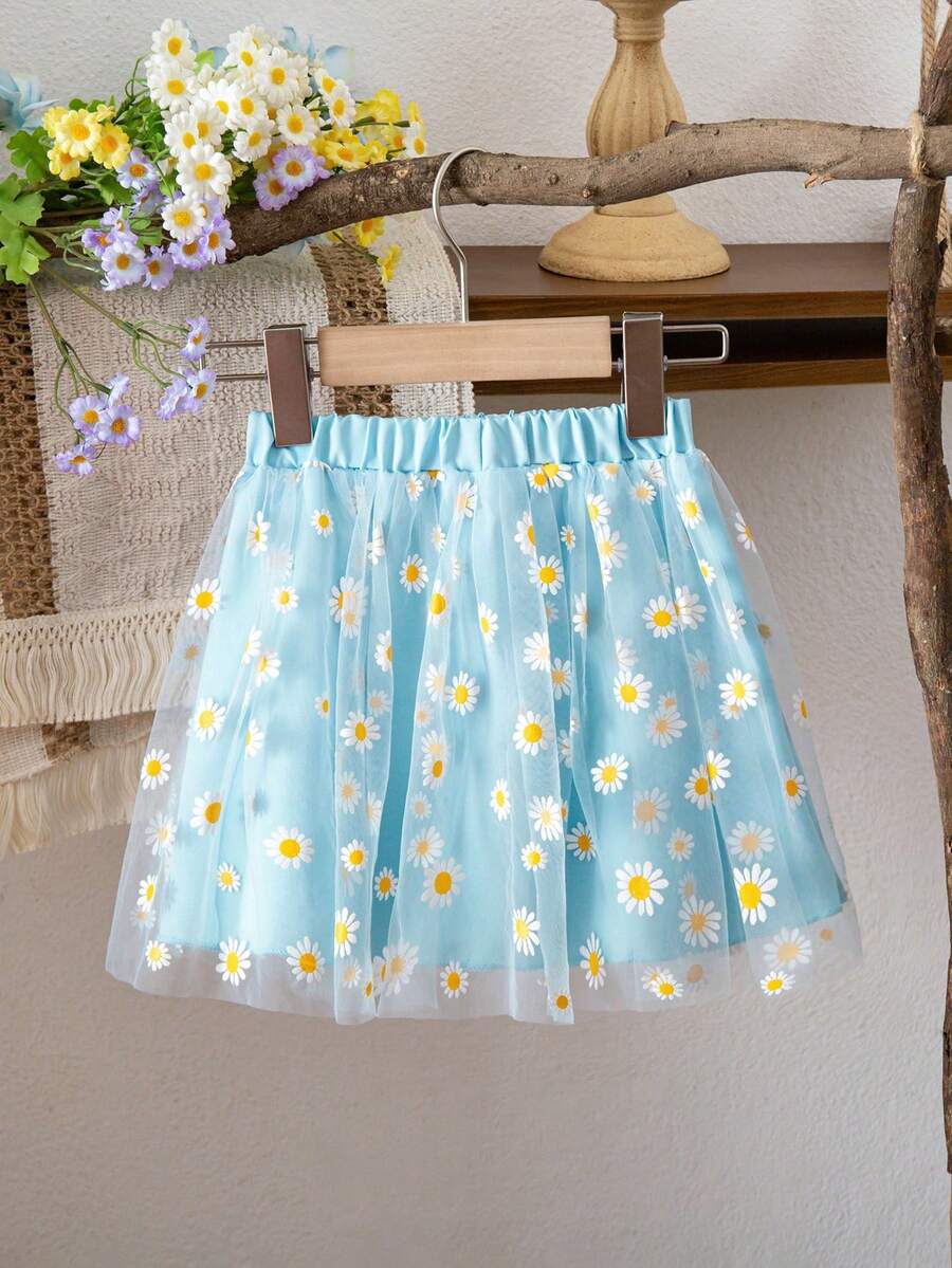 A Little Girl's Elegant Blue Skirt, Featuring A Layered Design With A Transparent Outer Layer Of Daisy-Printed Mesh Fabric. The Elastic Waistband Makes It Suitable For Everyday Wear, Beach Vacations, And Casual Outings - Blue - View 1