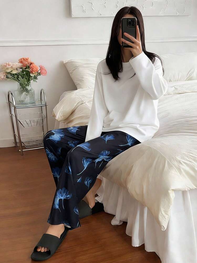 2pcs Solid Color Loose Long Sleeve T-Shirt & Straight Leg Allover Print Pants Pajama Set, Spring & Autumn For Women