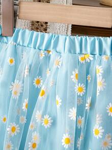 A Little Girl's Elegant Blue Skirt, Featuring A Layered Design With A Transparent Outer Layer Of Daisy-Printed Mesh Fabric. The Elastic Waistband Makes It Suitable For Everyday Wear, Beach Vacations, And Casual Outings - Blue - View 8