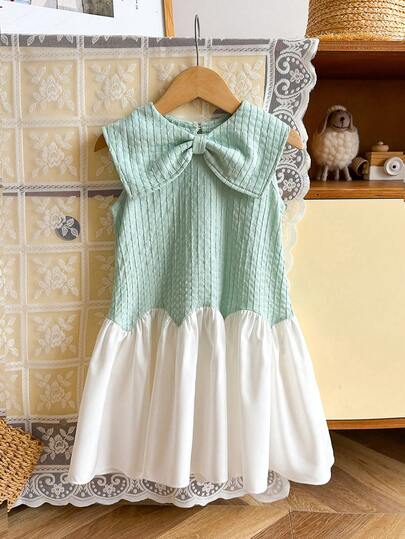 Vestidos elegantes de unicolor para niñas. El diseño exquisito de gran lazo agrega un encanto adorable. La silueta de línea A es elegante y grácil. La tela texturizada mejora el temperamento. Ideal para varias ocasiones: llamativo para juegos al aire libre, cómodo para el ocio en casa, elegante y deslumbrante para fiestas. Una elección perfecta para pequeñas princesas. Listo para las vacaciones de verano.