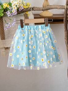 A Little Girl's Elegant Blue Skirt, Featuring A Layered Design With A Transparent Outer Layer Of Daisy-Printed Mesh Fabric. The Elastic Waistband Makes It Suitable For Everyday Wear, Beach Vacations, And Casual Outings - Blue - View 2
