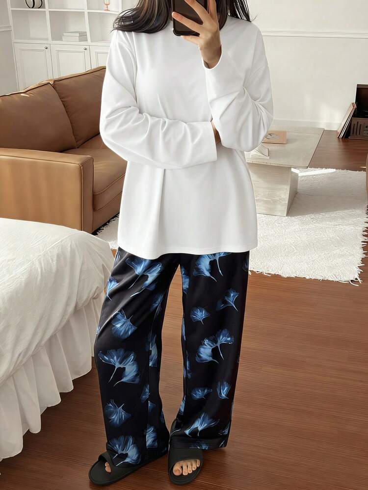 2pcs Solid Color Loose Long Sleeve T-Shirt & Straight Leg Allover Print Pants Pajama Set, Spring & Autumn For Women