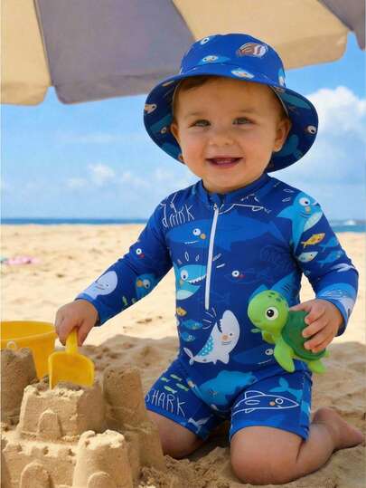 SHEIN Traje de baño para niños pequeños, bañador de una pieza con estampado de dinosaurio de dibujos animados y gorro de sol a juego, adecuado para vacaciones de verano, playa, surf, parque acuático
