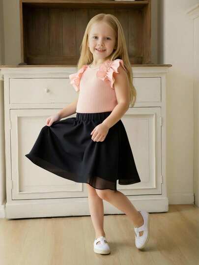 Girls' Multi-Colored Short-Sleeved T-Shirt And Skirt Set. The Pink Short-Sleeved Top Features Multi-Layered Ruffle Details On The Sleeves For A Snug Fit And Flattering Effect, Paired With A Black A-Line Skirt. Suitable For Everyday Casual Wear.