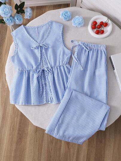 SHEIN 条纹无袖V领收腰上衣+宽松直筒裤，适合少女穿着——上衣上的蝴蝶结装饰散发着青春魅力，时尚百搭，是日常穿着的理想选择。