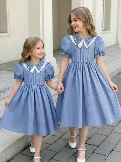 1件女童时尚简约优雅纯色串珠刺绣荷叶边领泡泡袖收腰A字公主裙，适合日常、通勤、度假穿着
