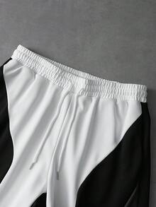 PAVTROS Bộ áo thun và quần short nam phối màu thường ngày, phong cách mùa hè, Y2K, lễ hội, retro, đường phố, năm mới, màu đen, trắng và xám. Áo thun cổ tròn phối màu sọc, phối màu theo kiểu patchwork, thích hợp cho mùa xuân đến hè, Y2K, thời trang đường phố, lễ hội, kỳ nghỉ, quà tặng cho bạn trai, tiệc tùng, tập luyện, phong cách cổ điển, đi chơi, vintage. - Đen và trắng - Xem 5
