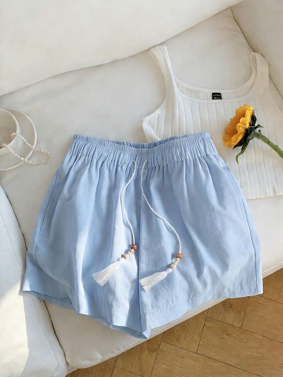 Resyla Quần short cạp cao nhẹ, màu trơn, có chi tiết tua rua, dây rút, thích hợp cho mùa hè. - Màu xanh nhạt - Xem 1