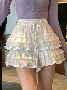 DAZY Quần short nữ màu trơn ngọt ngào, có bèo nhún ở gấu và dây rút ở eo, thích hợp cho mùa hè. - trắng - Xem 1