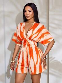 SOLERSUN Bộ jumpsuit nữ in hoa, cổ chữ V sâu, tay cánh dơi, eo nhún bèo. - trái cam - Xem 4