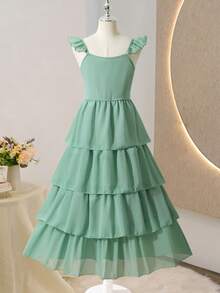 SHEIN 这款大码A字方领雪纺连衣裙，配有俏皮的细肩带和荷叶边细节，搭配独特的层叠蛋糕裙摆，尽显公主般的迷人气质。这是一款美丽优雅的小女孩派对礼服——绝对是一款令人惊艳的蛋糕裙！ - 綠色 - 查看 9