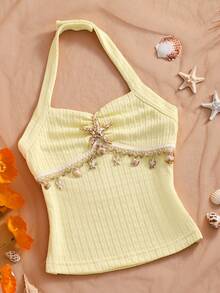 Elladie kids Áo croptop cổ yếm họa tiết sao biển màu trắng cho bé gái | Áo kiểu dáng ôm sát, nhún bèo, nơ rời, kiểu dáng ngắn với họa tiết sao biển và dây ngọc trai giả | Phong cách biển cả ngọt ngào, thêm nét tinh tế | Thiết kế cổ yếm + nơ rời | Kiểu dáng linh hoạt, có thể điều chỉnh độ vừa vặn | Chất liệu nhún bèo ôm sát | Ôm sát không gây khó chịu, thoải mái và thời trang - Màu vàng - Xem 9