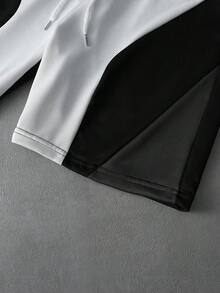 PAVTROS Bộ áo thun và quần short nam phối màu thường ngày, phong cách mùa hè, Y2K, lễ hội, retro, đường phố, năm mới, màu đen, trắng và xám. Áo thun cổ tròn phối màu sọc, phối màu theo kiểu patchwork, thích hợp cho mùa xuân đến hè, Y2K, thời trang đường phố, lễ hội, kỳ nghỉ, quà tặng cho bạn trai, tiệc tùng, tập luyện, phong cách cổ điển, đi chơi, vintage. - Đen và trắng - Xem 4
