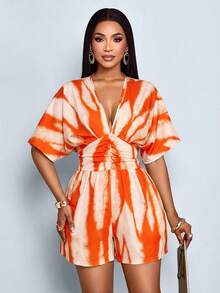 SOLERSUN Bộ jumpsuit nữ in hoa, cổ chữ V sâu, tay cánh dơi, eo nhún bèo. - trái cam - Xem 6