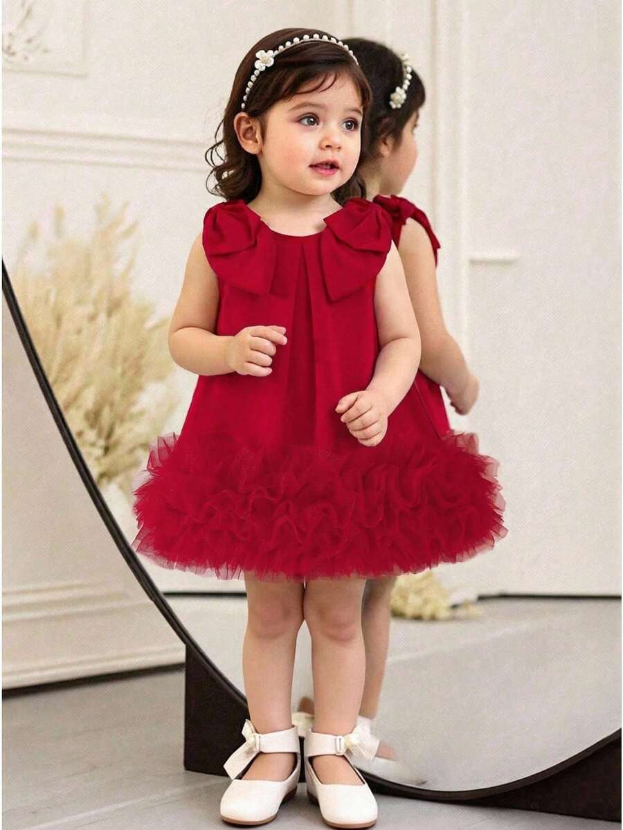 SHEIN Vestido elegante sin mangas con cuello redondo y decoración de lazo, unicolor, para niñas, verano - Rojo - Ver 1