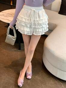 DAZY Quần short nữ màu trơn ngọt ngào, có bèo nhún ở gấu và dây rút ở eo, thích hợp cho mùa hè. - trắng - Xem 9