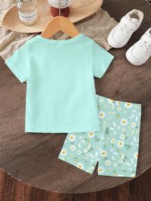 SHEIN Bộ 2 món cho bé gái, áo thun ngắn tay in hoa và bướm, cùng quần short in họa tiết tối giản, thích hợp cho các hoạt động mùa hè. - Nhiều màu - Xem 2