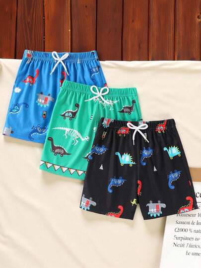 SHEIN Bộ 3 quần short mùa hè dáng rộng thoải mái, in hình khủng long dễ thương dành cho bé trai.