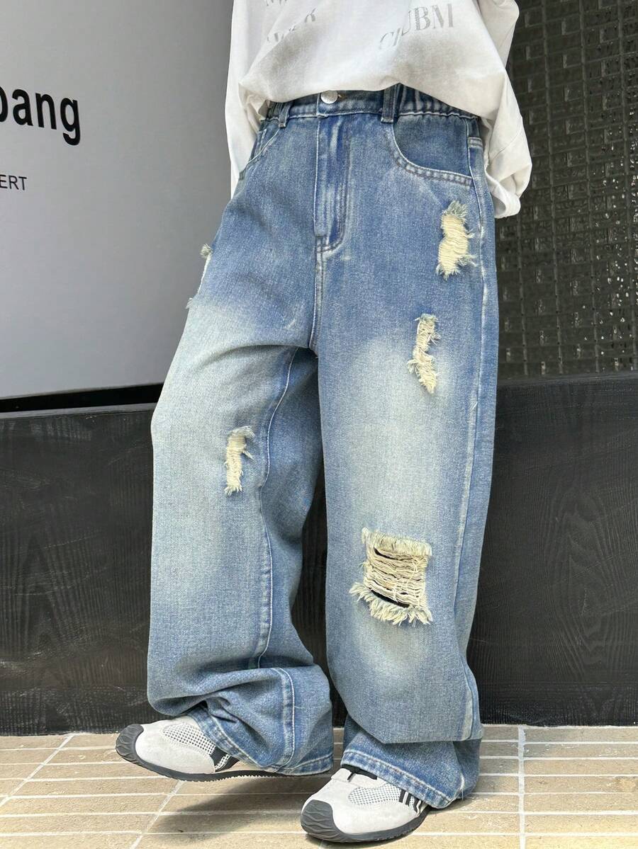 Quần jeans ống đứng rách vintage dành cho bé trai tuổi teen, phong cách đường phố năng động, thoải mái, phù hợp với học sinh! Chất liệu denim xanh bạc màu, thoải mái, thiết kế rách tạo điểm nhấn cá tính, cạp cao co giãn + khóa kéo phía trước, tiện lợi khi mặc và cởi, dáng ống thẳng tôn dáng, giúp đôi chân trông dài hơn. Thích hợp cho các hoạt động hàng ngày, đi học, mùa tựu trường, du lịch và dạo phố, bạn sẽ là người nổi bật nhất trên phố! - Rửa nhẹ - Xem 1