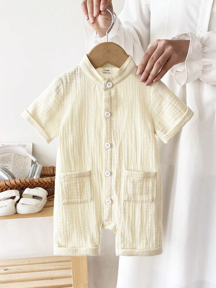 SHEIN 幼儿男童纽扣前袋贴片立领连体衣，适合日常休闲穿着、旅行、聚会、节日和上学，春夏季节（3个月-2岁） - 杏色 - 查看 1