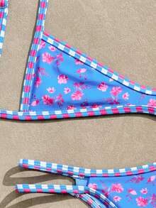 Swim Mod Bộ đồ bơi hai mảnh phối họa tiết hoa lá tương phản kiểu Âu và Mỹ, kiểu dáng thong buộc dây bên hông, màu vàng hoa nhí phối tua rua, bikini nâng ngực gợi cảm, thích hợp cho bãi biển, spa và tiệc sinh nhật. - Nhiều màu - Xem 5