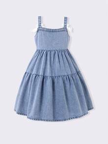 Đầm hai dây denim cho bé gái tuổi teen, kiểu dáng Hàn Quốc mới, đa năng, màu trắng, nơ trang trí, cài cúc phía trước, chân váy xếp tầng, chất liệu denim cotton cao cấp, thoải mái, thích hợp mặc hàng ngày đến trường, đi nghỉ mát, đầm denim mùa hè cho trẻ em, đầm hai dây cho bé gái. - Rửa nhẹ - Xem 3