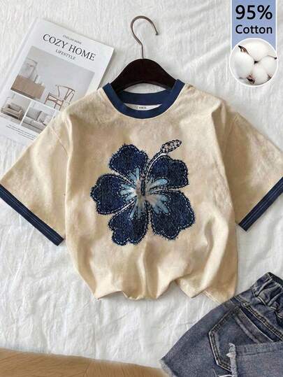 Tseoso 95% Cotton Casual Minimalist Blue Floral Round Neck Short Sleeve Loose Women's T-Shirt In Beige Apricot & Royal Blue Color Block - Spring & Summer Hibiscus Tee For Soft Girl Style, School, Dorm, Beach, Vacation, And Casual Outings Spring