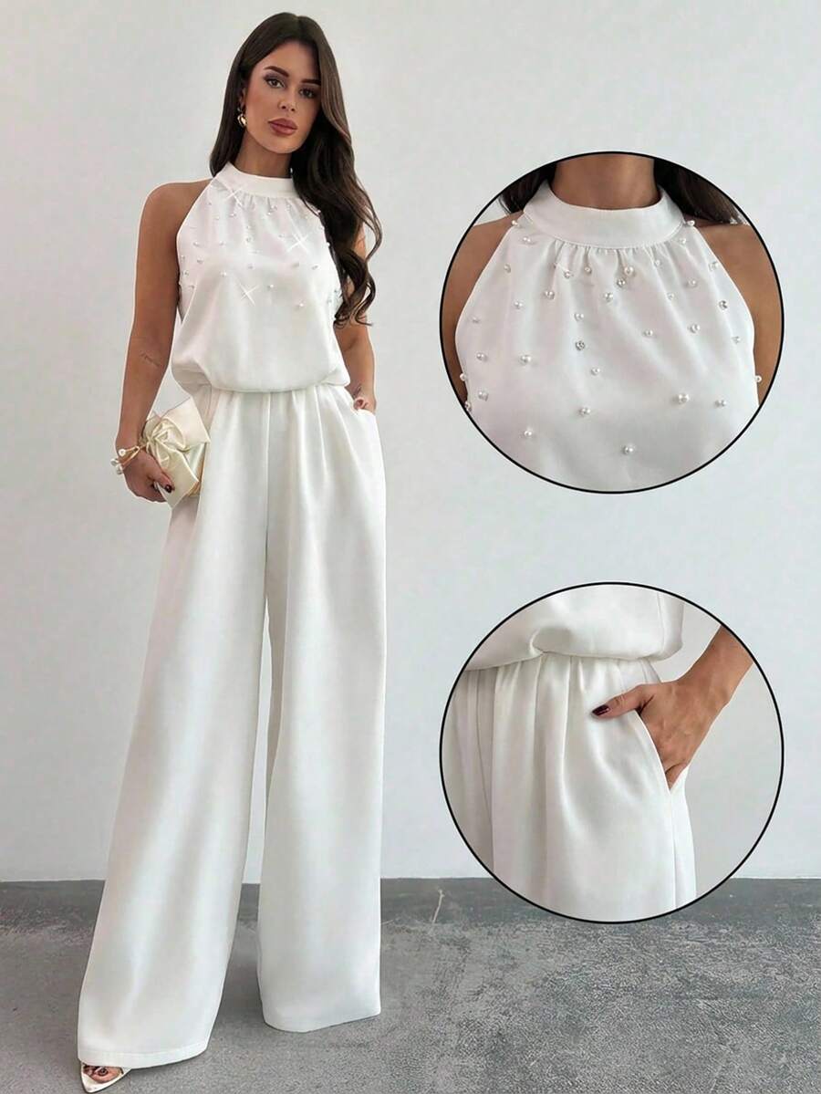 Firerie Quần ống rộng ôm dáng màu trắng không tay cổ tàu đính ngọc trai dành cho nữ, bộ jumpsuit trắng đính hạt lãng mạn, jumpsuit không tay, thời trang công sở, lễ tốt nghiệp, trang phục giáo viên, xuân/hè/thu, thanh lịch, đi làm, hẹn hò, tiệc tùng, lễ hội âm nhạc, mùa cưới, tốt nghiệp, dạ hội, biểu diễn, hòa nhạc, trang phục công sở, tựu trường, tiệc thường niên, sinh nhật nữ, trang phục ngày lễ - trắng - Xem 1