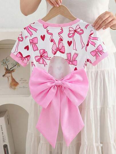 Áo thun croptop ôm sát, hở lưng, màu trơn dành cho bé gái, điểm nhấn là nơ organza ngoại cỡ, phong cách thanh lịch Pháp thời thượng, thích hợp cho mùa tựu trường, phong cách Y2K, ngọt ngào và cá tính.