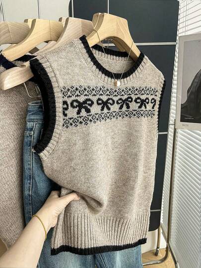 Franclia 新款春夏无袖复古风针织上衣，饰有蝴蝶结、罗纹滚边和撞色包边，舒适亲肤，百搭叠穿单品