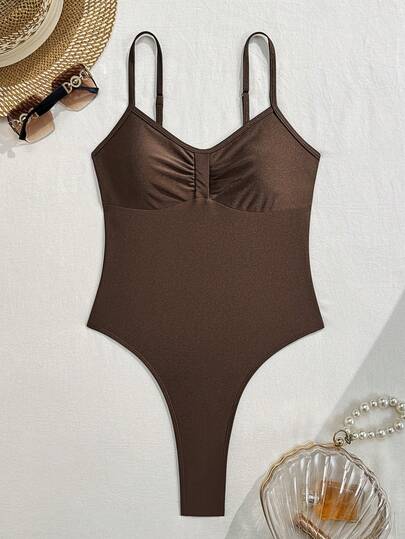 Swim SXY Sommar Ny Enfärgad Glödande Brun Hög Elastisk Rynka Högt Skärande Spaghettiband Thong Justerbar Band Viral Vacation One Piece Baddräkt För Damer