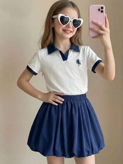 Elladie kids Set de 2 piezas: Blusa tipo polo con bloqueo de color y puños en las mangas en tela azul marino con bordado blanco en la cintura y dobladillo elástico, combinada con falda azul marino de corte evasé. Conjunto casual para la escuela o vacaciones para niñas preadolescentes.