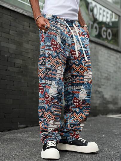 Manfinity EMRG بنطلون أزرق رجالي كبير الحجم بنمط جاكارد غير متماثل، خصر مطاطي وساق مستقيمة فضفاضة، مناسب للارتداء اليومي الكاجوال، الخروجات النهارية، مهرجانات الموسيقى، الحفلات والمناسبات الاجتماعية الأخرى
