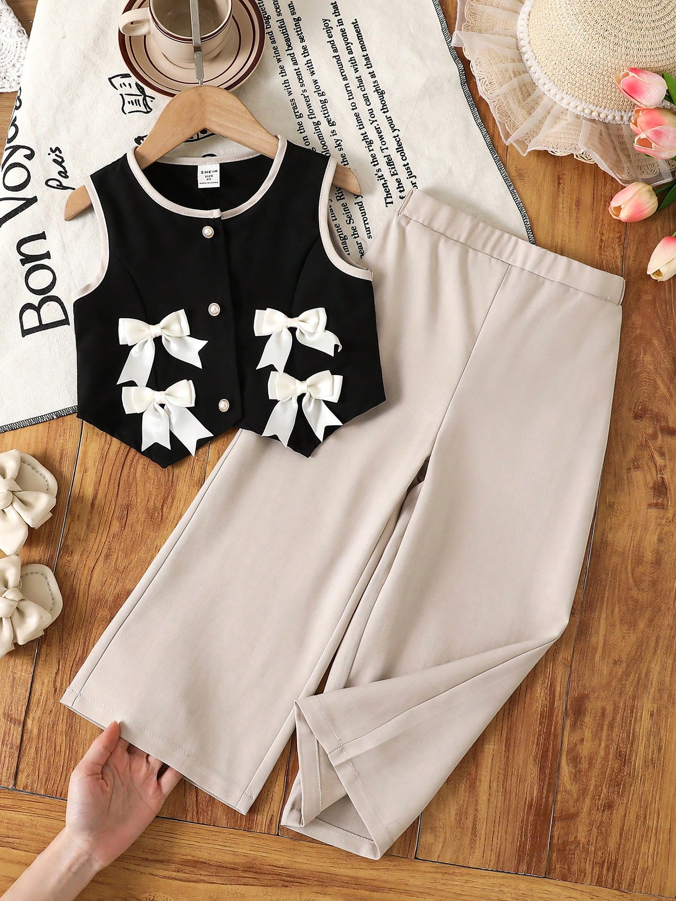 مجموعة فتاة صغيرة: ملابس علوية مزينة بفيونكة ذات ل...