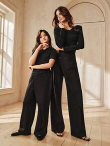 Anewsta 女童休闲纯黑色弹力腰不对称裤脚裤，适合年龄稍大的女孩穿着。 - 黑色 - 查看 7