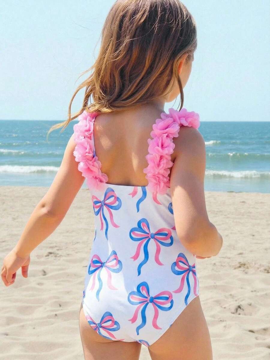 SHEIN Traje de baño de una pieza con rayas y lazo y flor 3D para niña - Azul y blanco - Ver 1