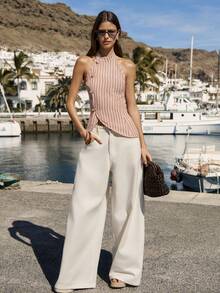 Nöista 这款竖条纹无袖上衣采用侧边打结设计，搭配毛领领口和后背可调节肩带。适合日常穿着，也适合春季、夏季、复活节和海滩等场合。 - 紅色 - 查看 6