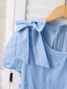 SHEIN 少女蓝色优雅连衣裙。这款公主风连衣裙适合儿童日常穿着、生日派对、钢琴演奏会、婚礼花童等各种场合。连衣裙采用蓝色雪纺面料，肩部饰有大蝴蝶结。 - 藍色 - 查看 8