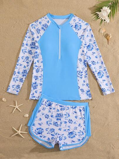 SHEIN Bộ bikini tankini cho bé gái tuổi teen, màu xanh nhạt trơn với họa tiết hoa trên tay áo và hai bên hông, áo nửa khóa kéo phía trước kết hợp với quần màu xanh nhạt trơn có họa tiết hoa, bộ 2 mảnh, thời trang giản dị thanh lịch, phù hợp cho bơi lội, kỳ nghỉ hè, bãi biển, hồ bơi, tiệc tùng ngày lễ.
