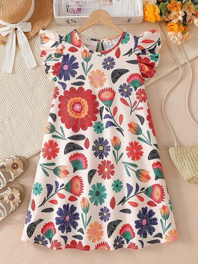 Vestido de niña con volantes en el bajo, cuello redondo y estampado floral tropical colorido, a juego con mamá