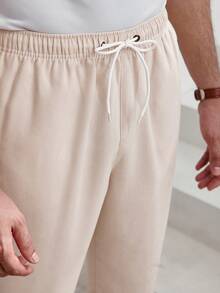 Manfinity Homme Men's Solid Color Drawstring Waist Pocket Tapered Casual Pants Beige Pants For Men Cream Joggers Men Men Drawstring Pants Men's Linen Bottoms Cream Pants Men Summeroutfit Mens Beige Pants Mens Textured Pants Mens Sweatpants Drawstring Lounge Pants Men Mens Cream Colored Pants Mens Casual Trousers Working Trousers Men Mens Relaxed Fit Pants Mens Summer Pants Pants For Men Casual Mens Regular Fit Pants Mens Draw-String Pants - Apricot - View 2