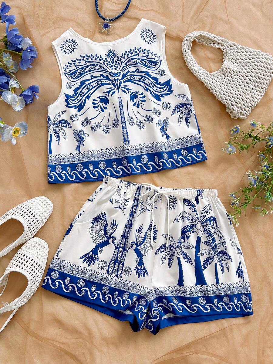 Soleia Bộ đồ đi nghỉ mát dành cho nữ, gồm áo tank top dáng chữ A rộng rãi, hở lưng, chất liệu vải có họa tiết, quần short cạp chun co giãn có túi, thích hợp cho bãi biển và bờ biển. - Nhiều màu - Xem 1