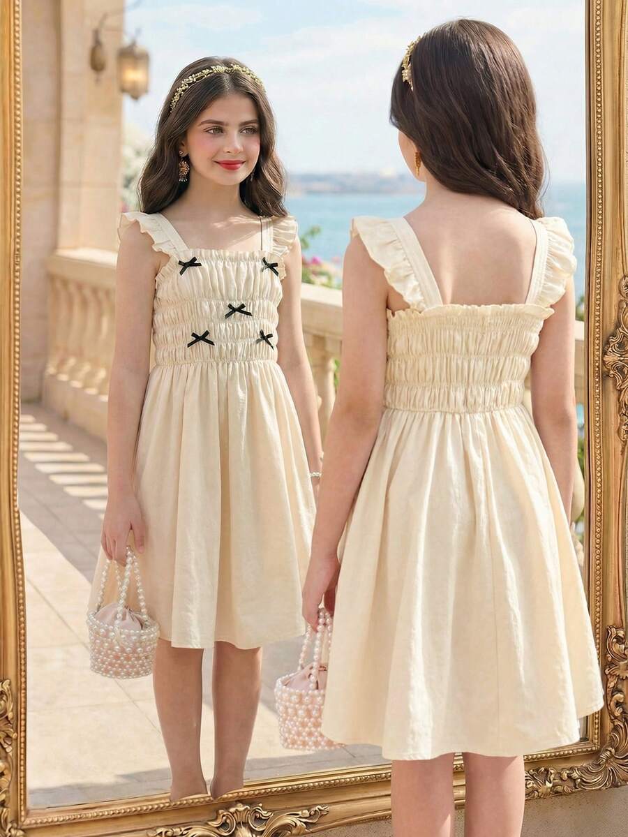 SHEIN Elladie kids 1pc Tween Girls Summer New Linen-Like Cami Dress, Black Ribbon Bow Accent, Beige Minimalist Elegant Casual Vacation Dress For Older Tween Girl - Apricot - View 1